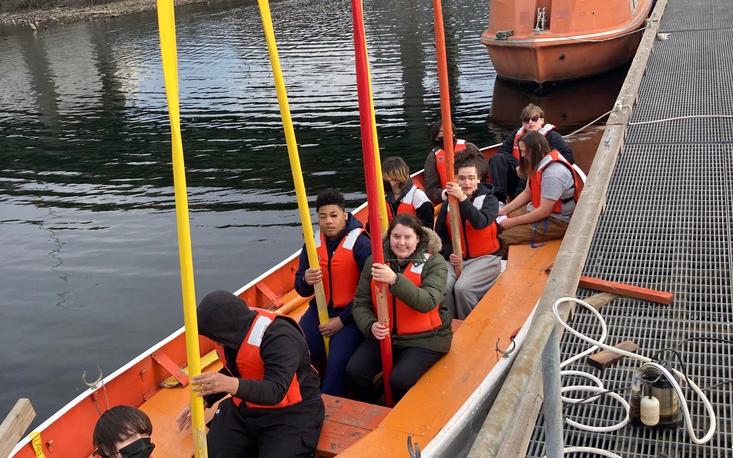 students on a boat during a maritime vessel operations skills center course