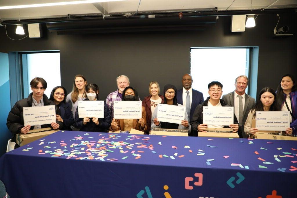 Students were called to Amazon Skills Center under guise of a Computer Science panel and were surprised with the announcement that they had won the AFE Scholarship.