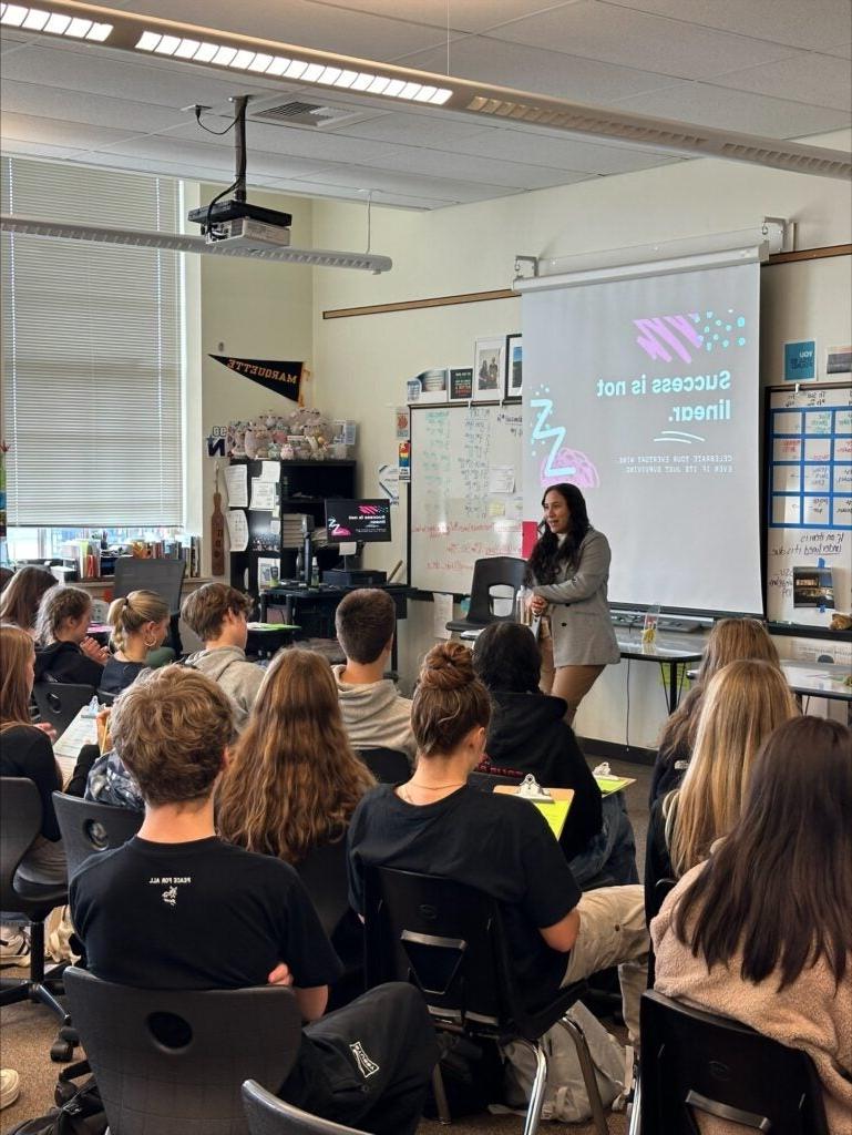 Students sit in class listening to guest lecturers at Roosevelt HS