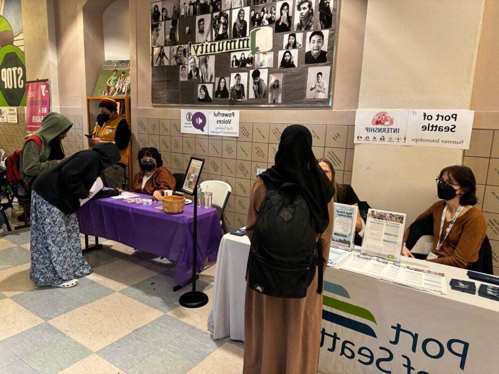 Students visiting vendors at high school career fair