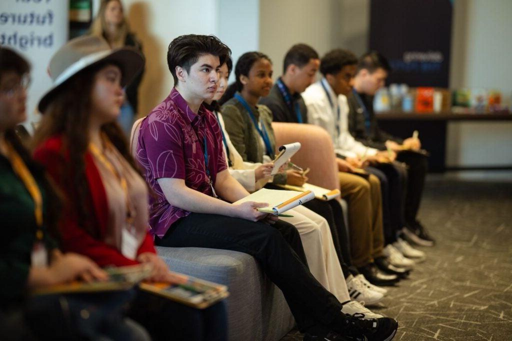 students listening to speakers at Amazon Future Engineer Scholarship